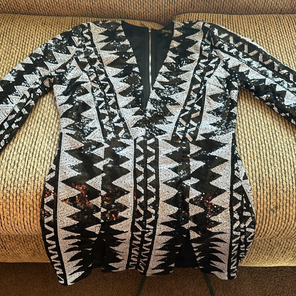 Worn once for New Years. Black/White 2 split dress. Sparkled down front & back.